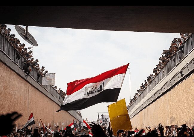 المسيرة الطلابية أثناء ثورة تشرين في بغداد، تصوير محمد البولاني